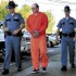 Cold+Case+Killing_Acco Maine state troopers lead Jay Mercier from Somerset Superior Court in Skowhegan today where he pleaded not guilty of murdering Rita St. Peter. AP